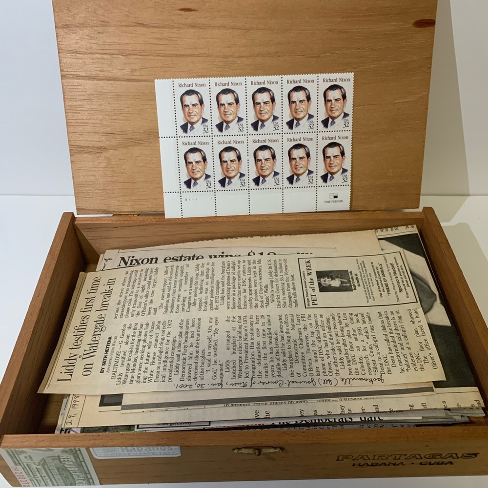 President Nixon stamps and newspaper clippings